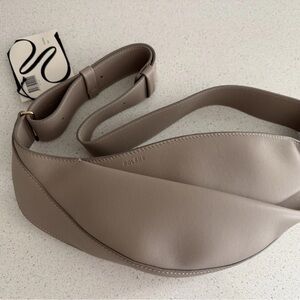 Polene Curved Crossbody Bag in Taupe